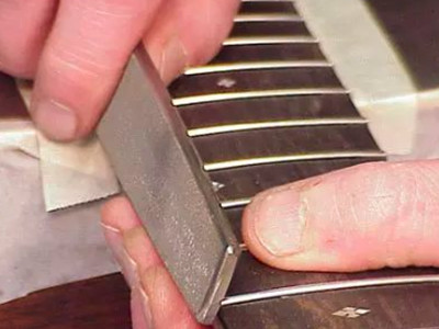 repair guitar frets